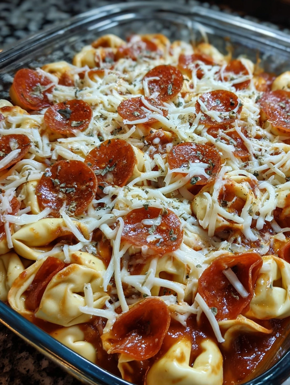 A delicious cheese tortellini pepperoni pizza casserole.