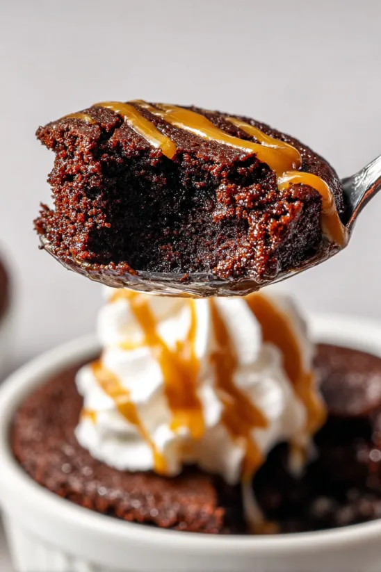 A spoonful of chocolate peanut butter mug cake.