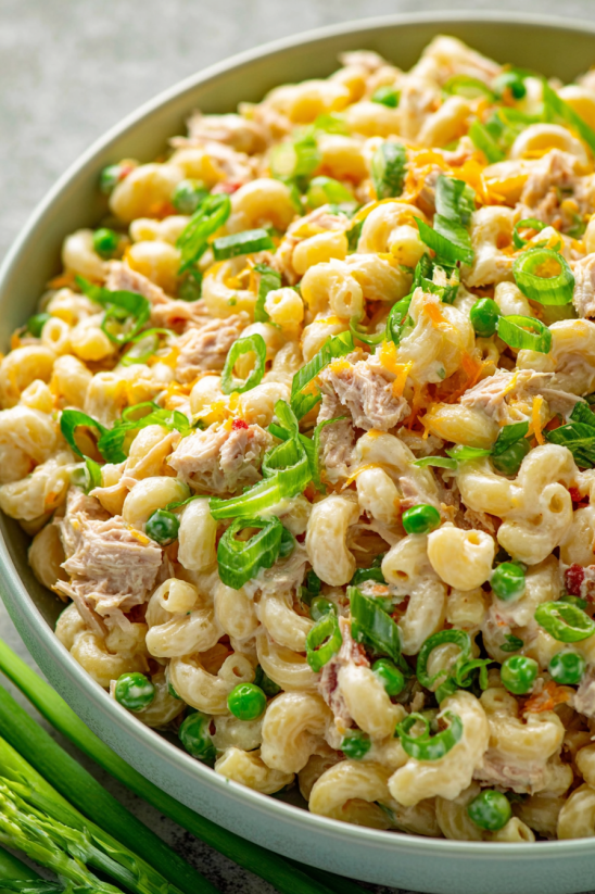 A bowl of creamy tuna macaroni salad.