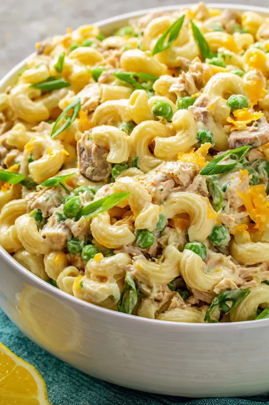 A bowl of creamy tuna macaroni salad.