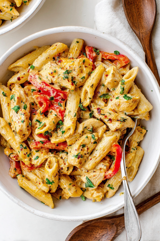 A bowl of creamy cajun chicken pasta.
