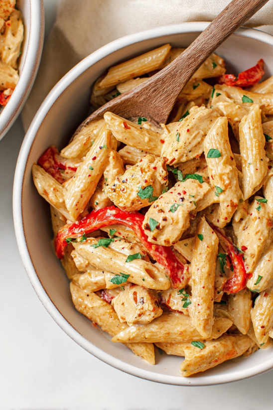 A bowl of creamy cajun chicken pasta.