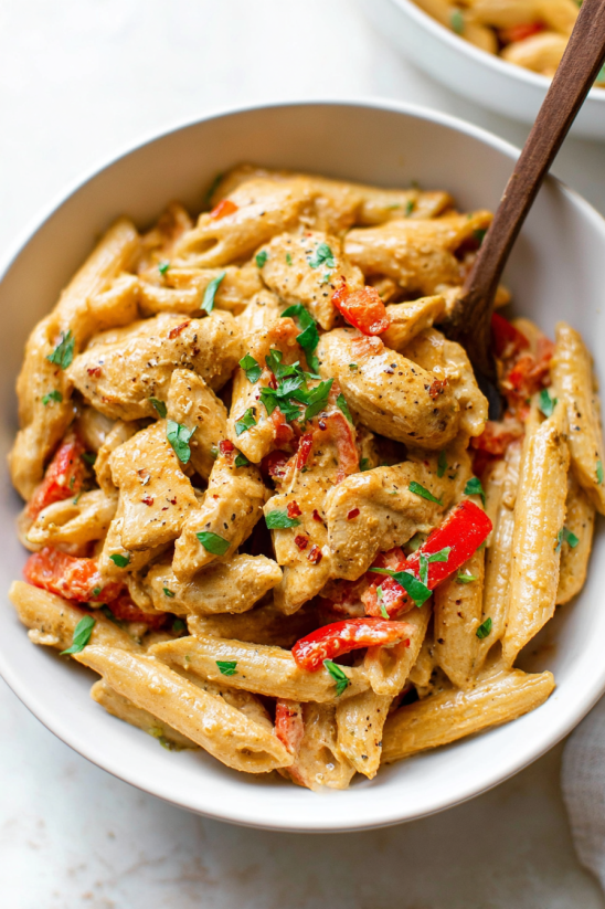 A bowl of creamy cajun chicken pasta.
