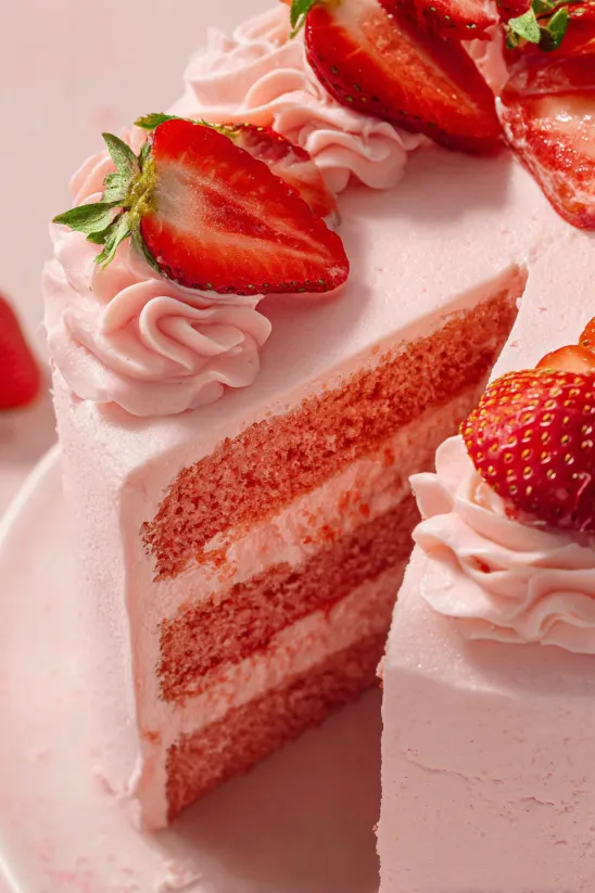 A slice of a homemade strawberry cake.