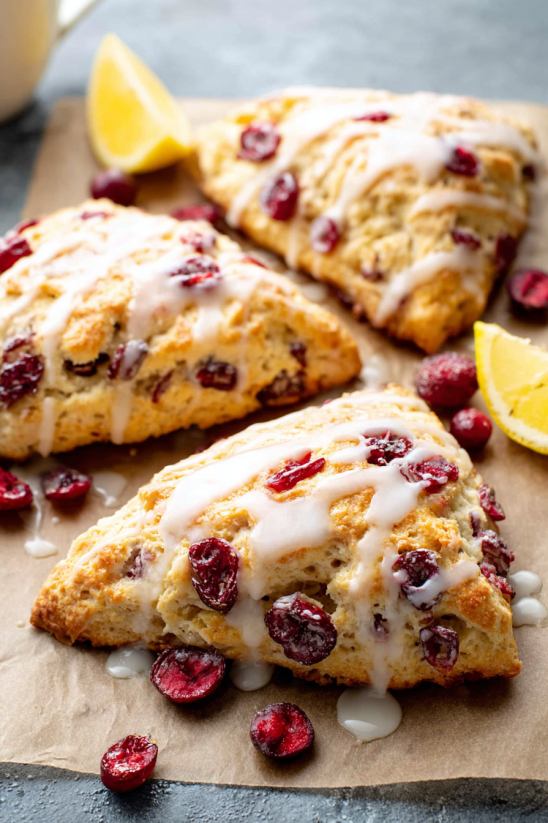 A close up of a cranberry orange scone.