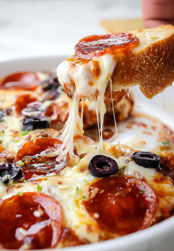 A slice of pizza with cheese and olives.