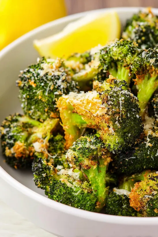A bowl of Parmesan roasted broccoli.