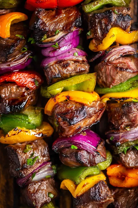 Steak kabobs with peppers and onions.