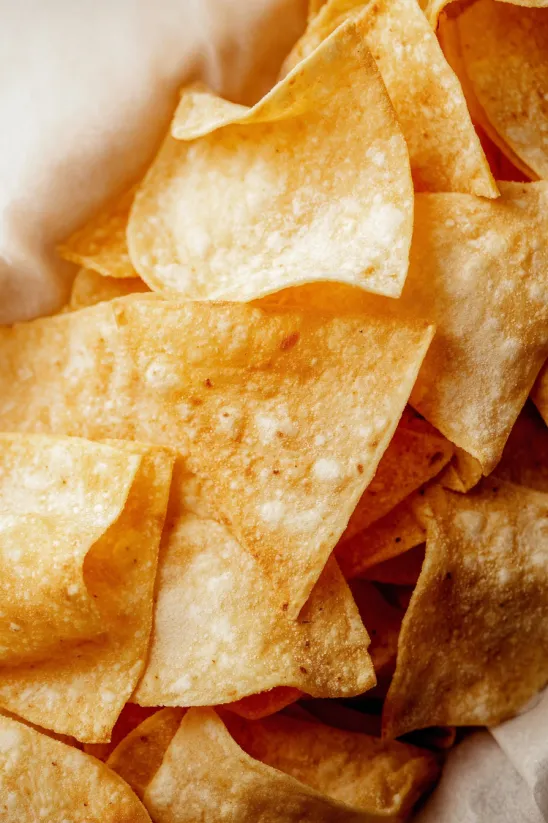 A pile of homemade tortilla chips.