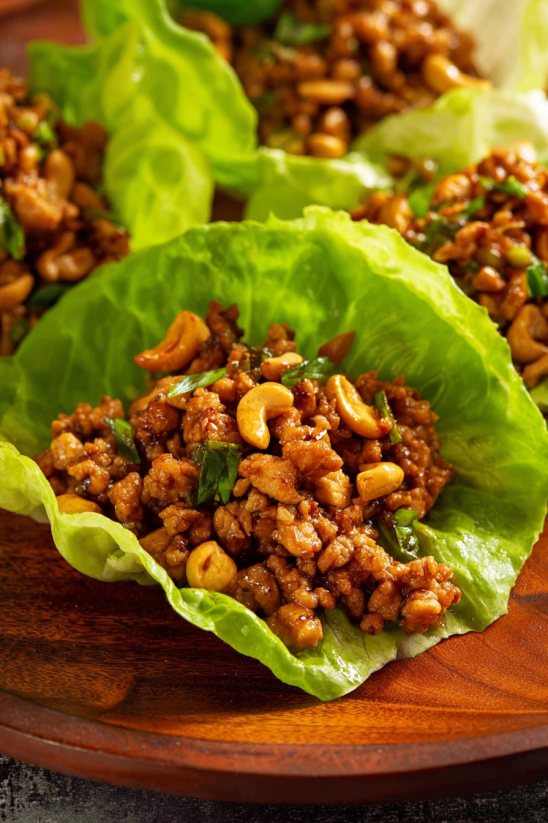A plate of chicken lettuce wraps.
