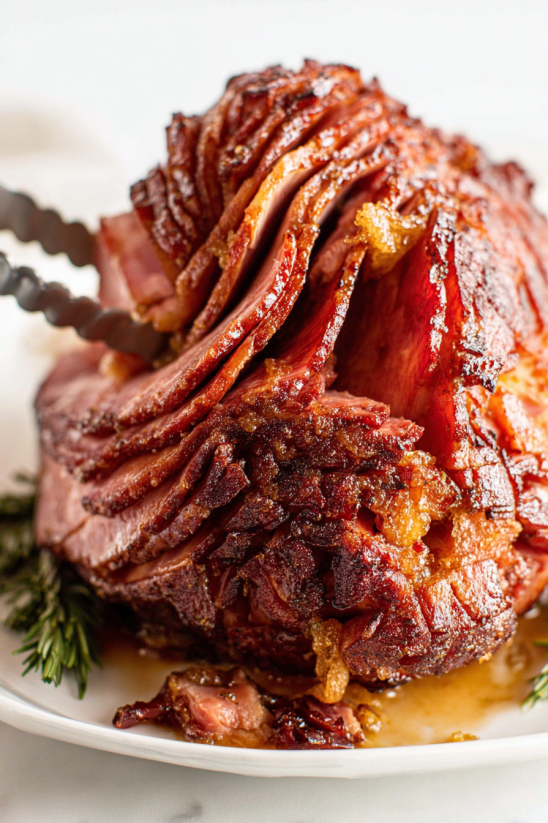 A close up of a crockpot ham.