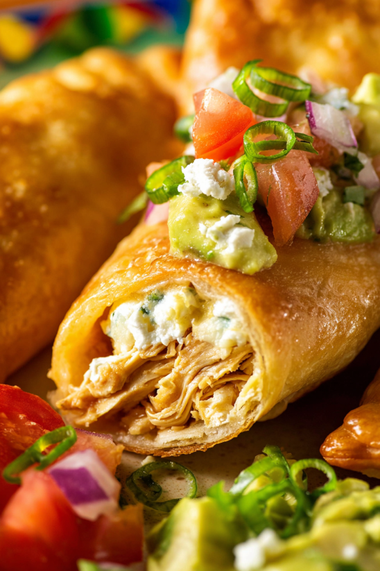 Chicken Taquitos with guacamole and salsa.