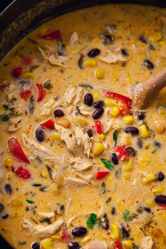 A crockpot filled with chicken tortilla soup.