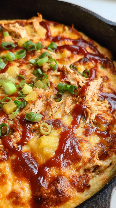 A cheesy barbecue chicken dip with green onions.
