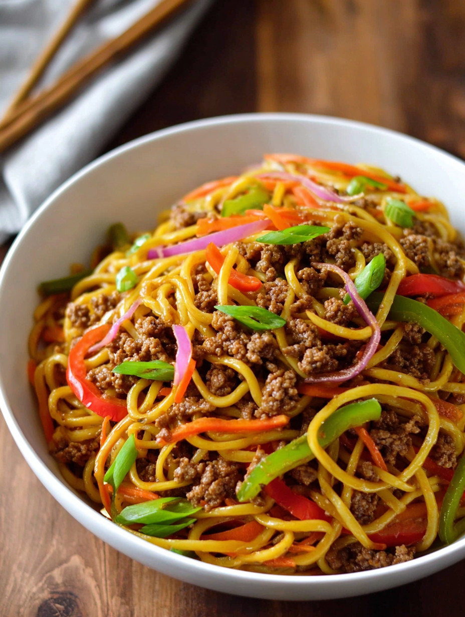 A bowl of ground beef lo mein noodles.
